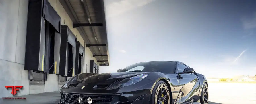 Onyx Concept 8XX Velocita carbon body conversion on a black Ferrari 812