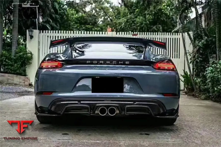 PORSCHE 718 CAYMAN & BOXSTER AM STYLE CARBON FIBER REAR LIP WITH CAPS BSD